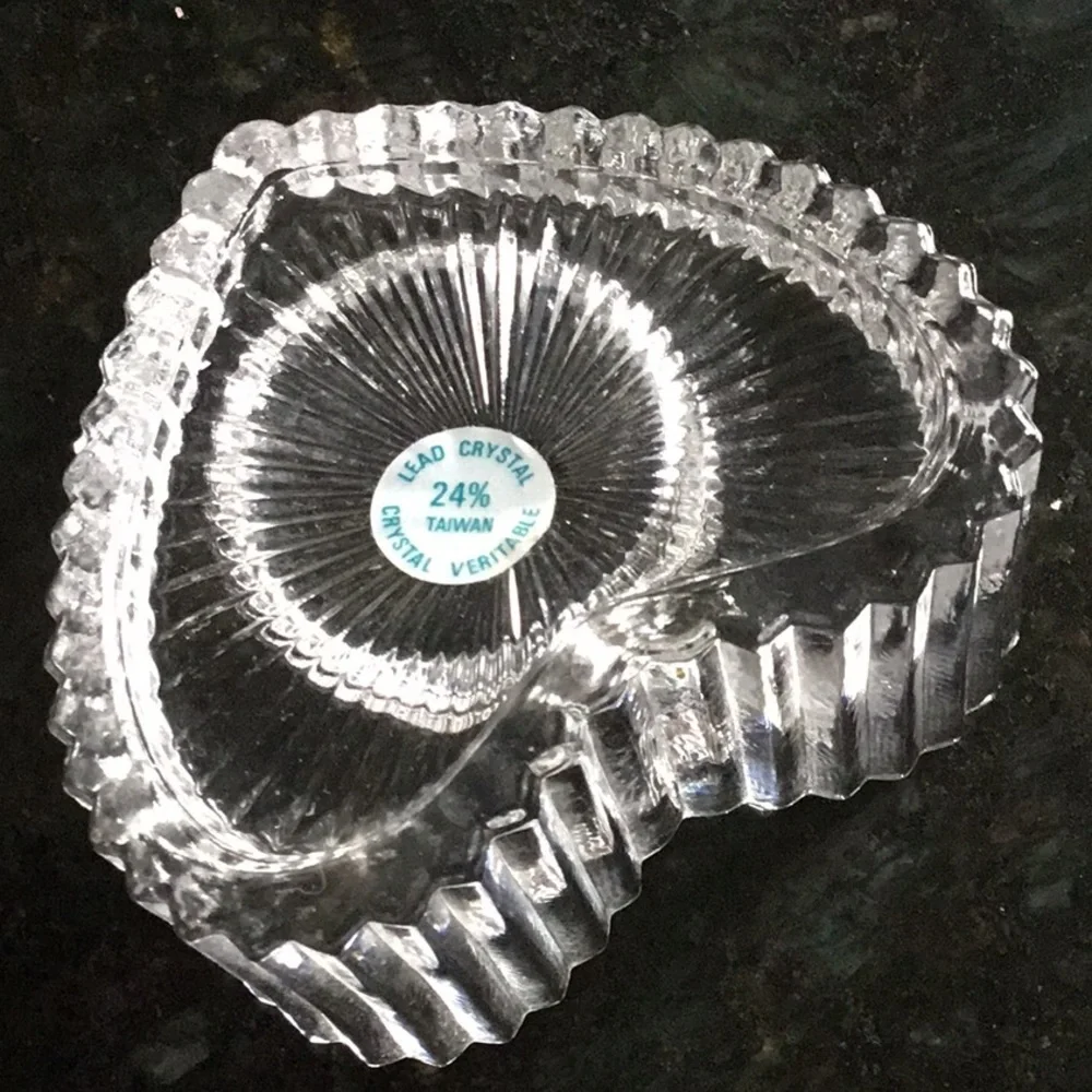 Lead crystal heart votive holder.